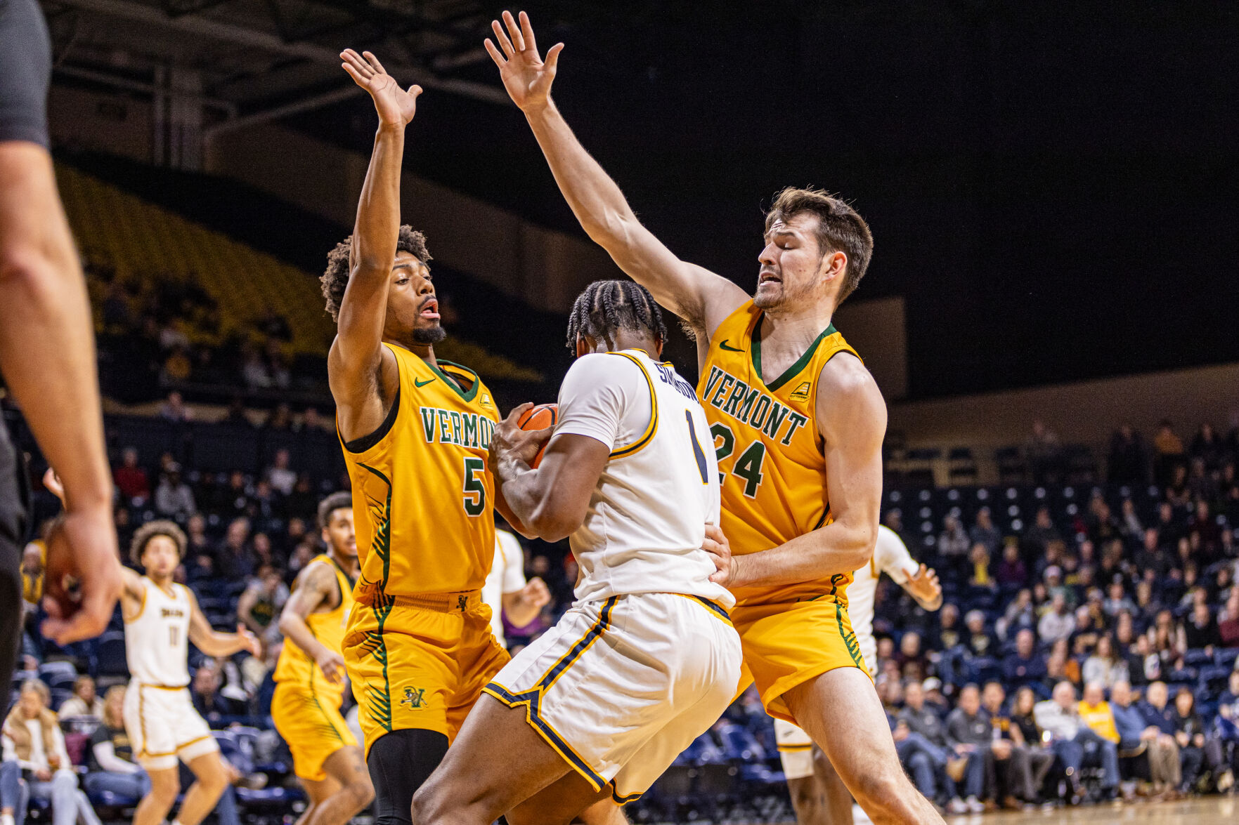 College Roundup: UVM men, women lock up victories